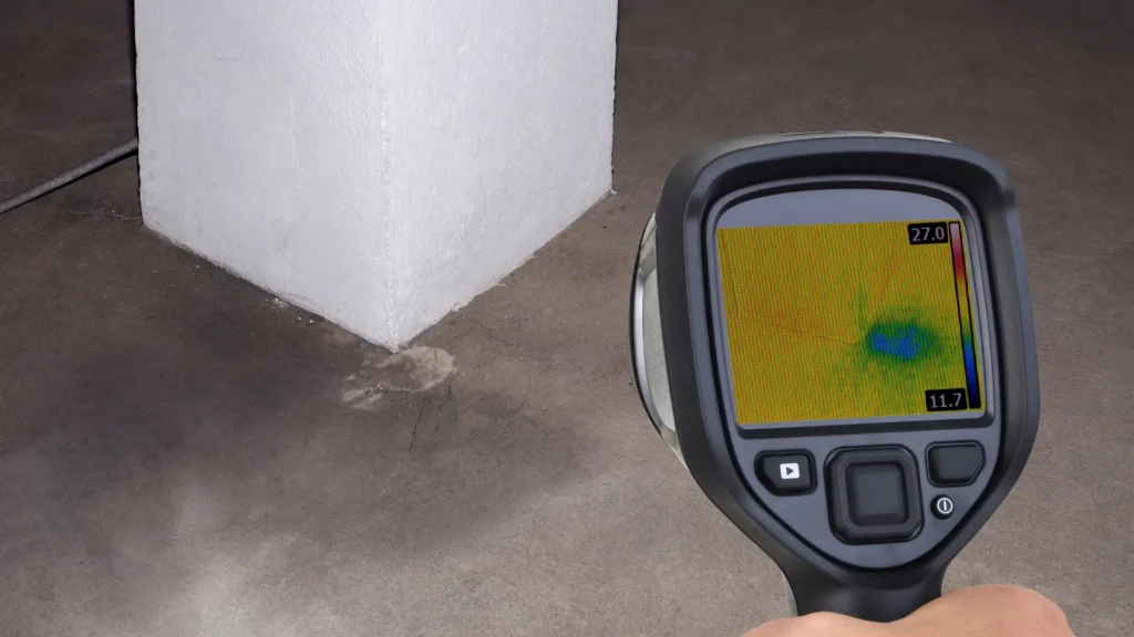 plumber using leak detection equipment 